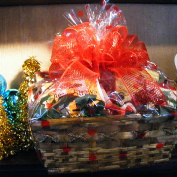 Custom holiday gift basket with red ribbon
